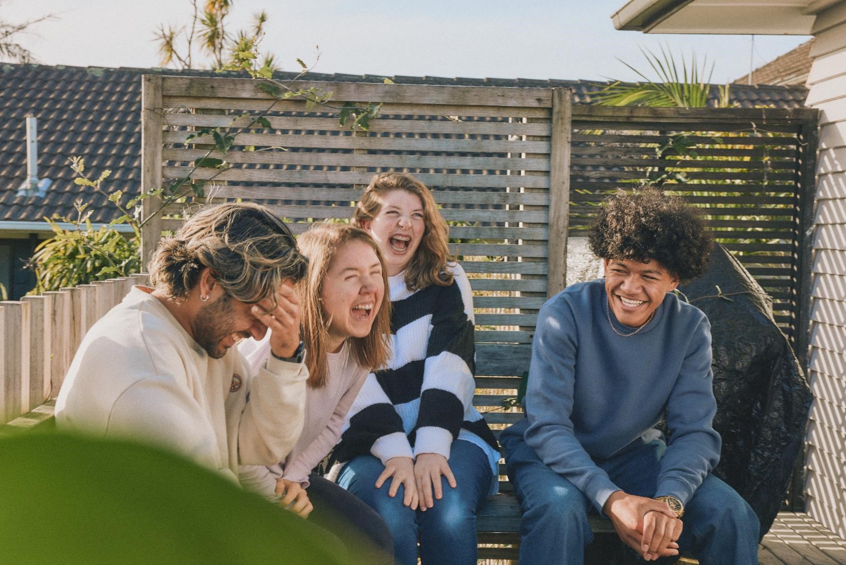 rangatahi impacted by cancer laughing together