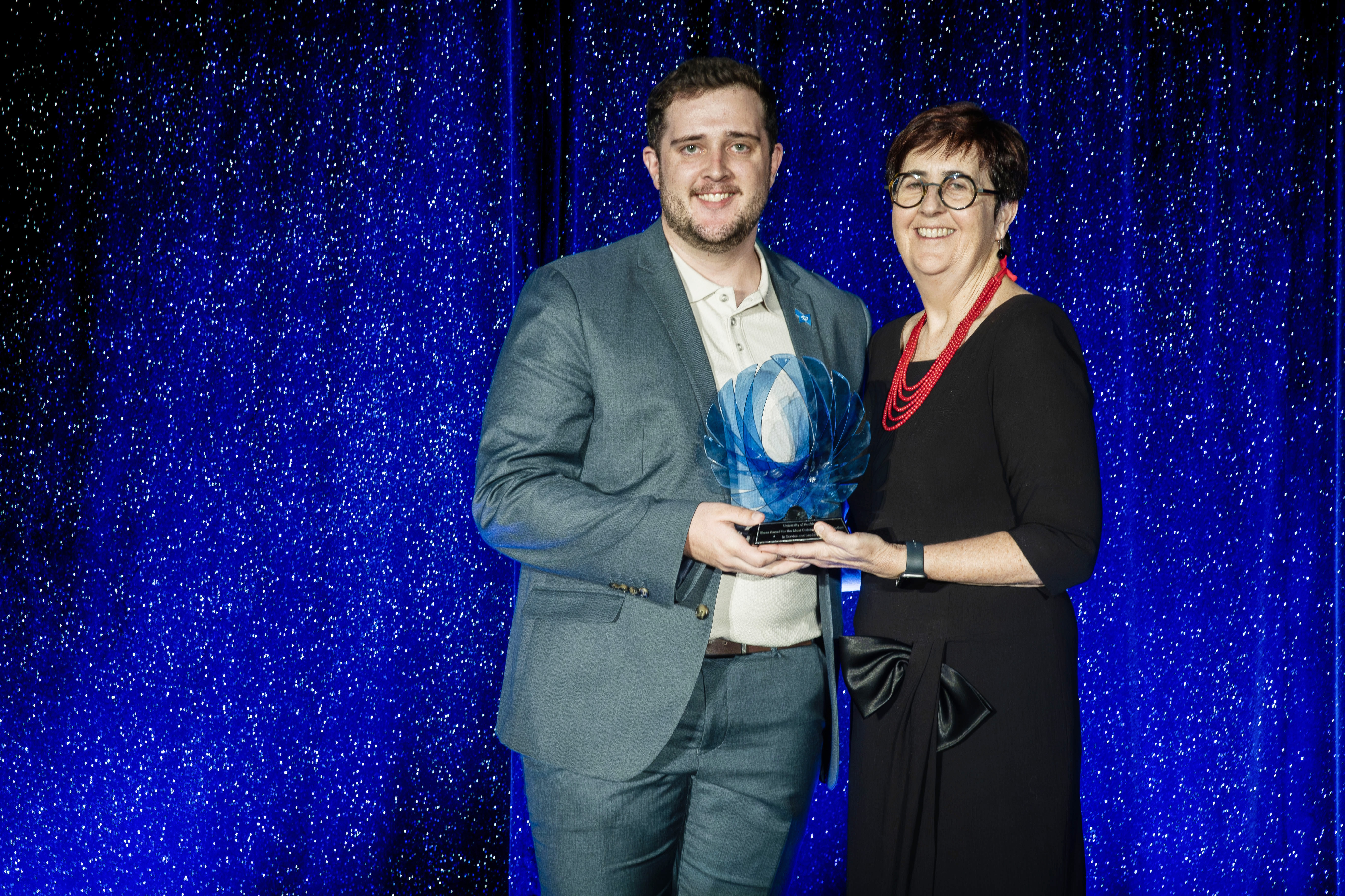 Josh receiving the Auckland University Blues Award